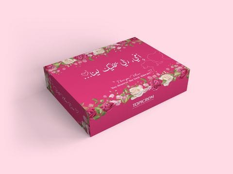 Coffret cadeau rose et doré conçu pour Topicrem